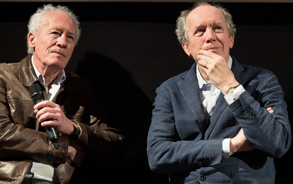 Belgium film directors Jean-Pierre (L) and Luc Dardenne speak during a conference on the Belgium film industry presented during the upcoming Cannes Film Festival, in Brussels. — AFP