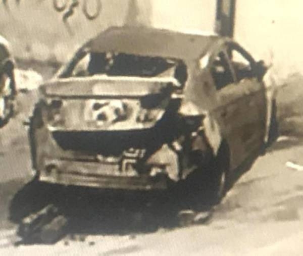 The car belonging to schoolteacher Amira after it was completely burned down in Taif on Thursday.