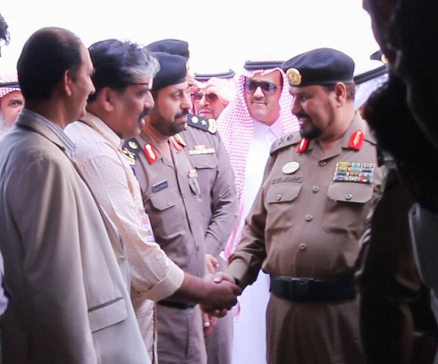 Shoukat Nass, second from left, with some of his compatriots who needed his assistance.