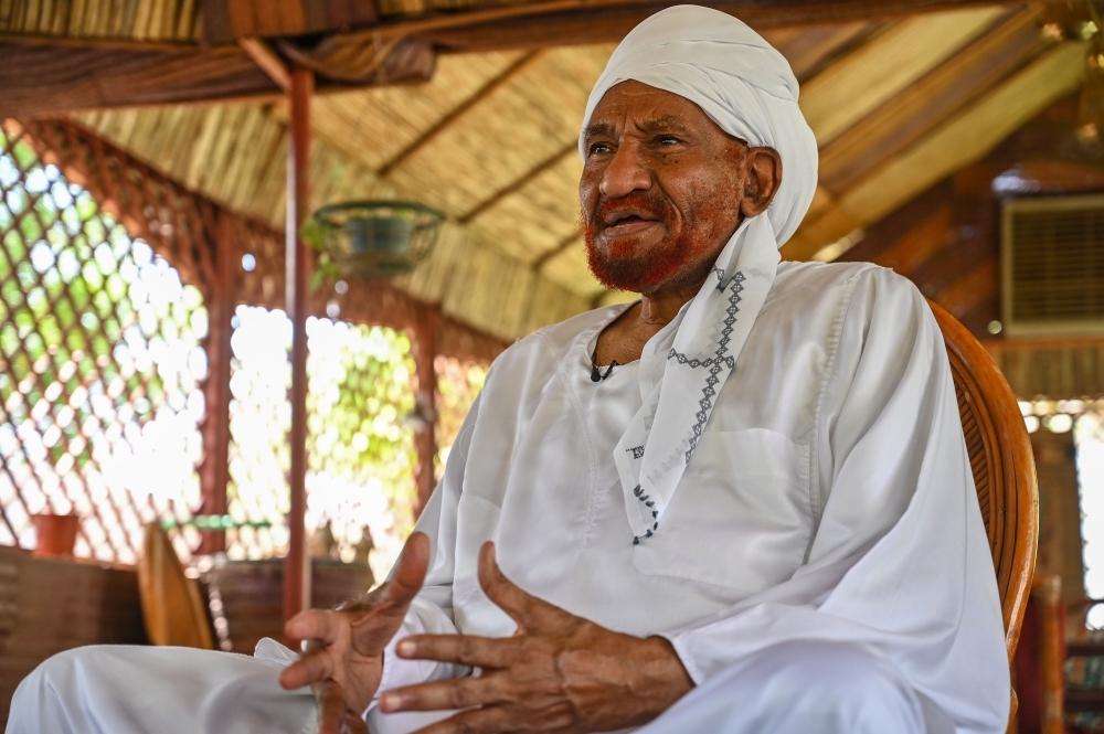 Sudan’s top opposition leader and former prime minister Sadiq Al-Mahdi, whose elected government was toppled in a 1989 coup, speaks during an interview at his residence in Omdourman, Sudan, on Wednesday. — AFP