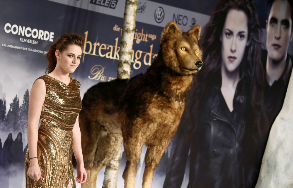 Cast member Kristen Stewart poses for pictures before the German premiere of The Twilight Saga: Breaking Dawn Part 2 in Berlin November 16, 2012. — Reuters