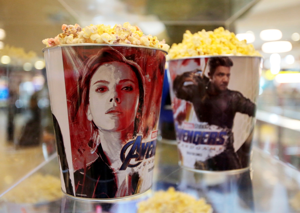 Popcorn buckets with Avengers images are seen during an early premiere of 