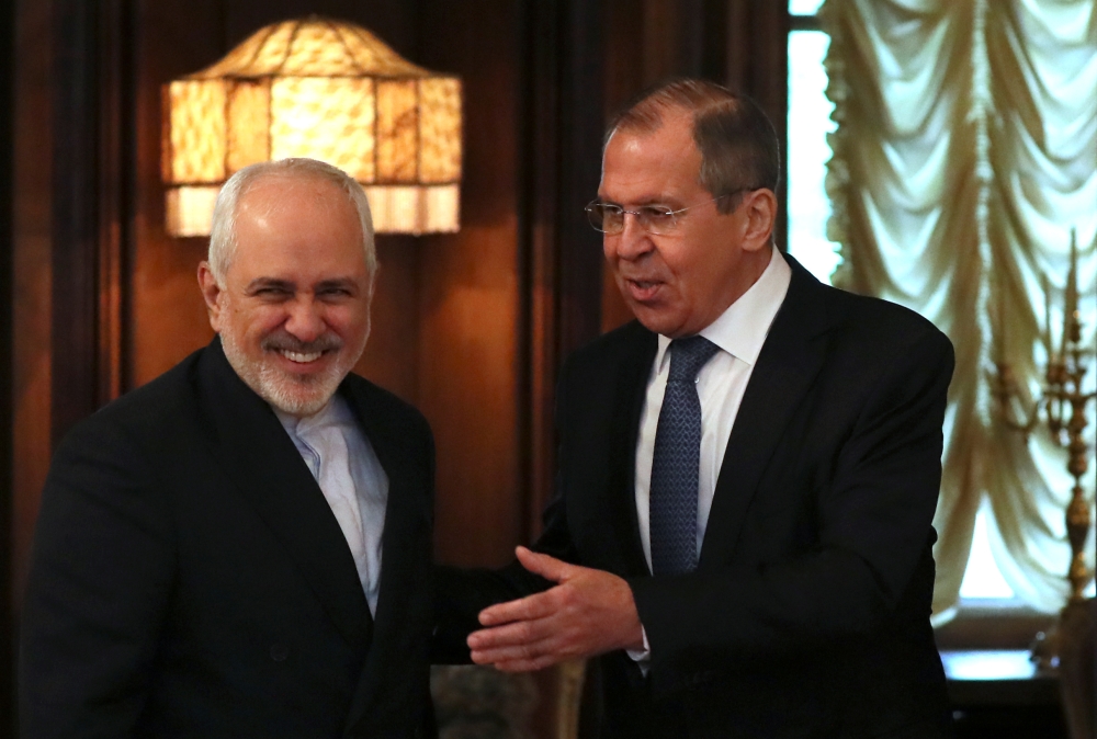 Russian Foreign Minister Sergei Lavrov meets with his Iranian counterpart Mohammad Javad Zarif in Moscow on Wednesday. — Reuters