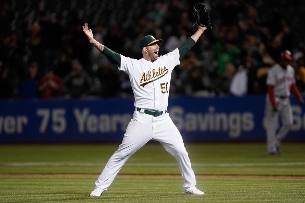 Oakland Athletics starting pitcher Mike Fiers (50) celebrates after pitching a no hitter against the Cincinnati Reds at Oakland Coliseum, CA. — Reuters