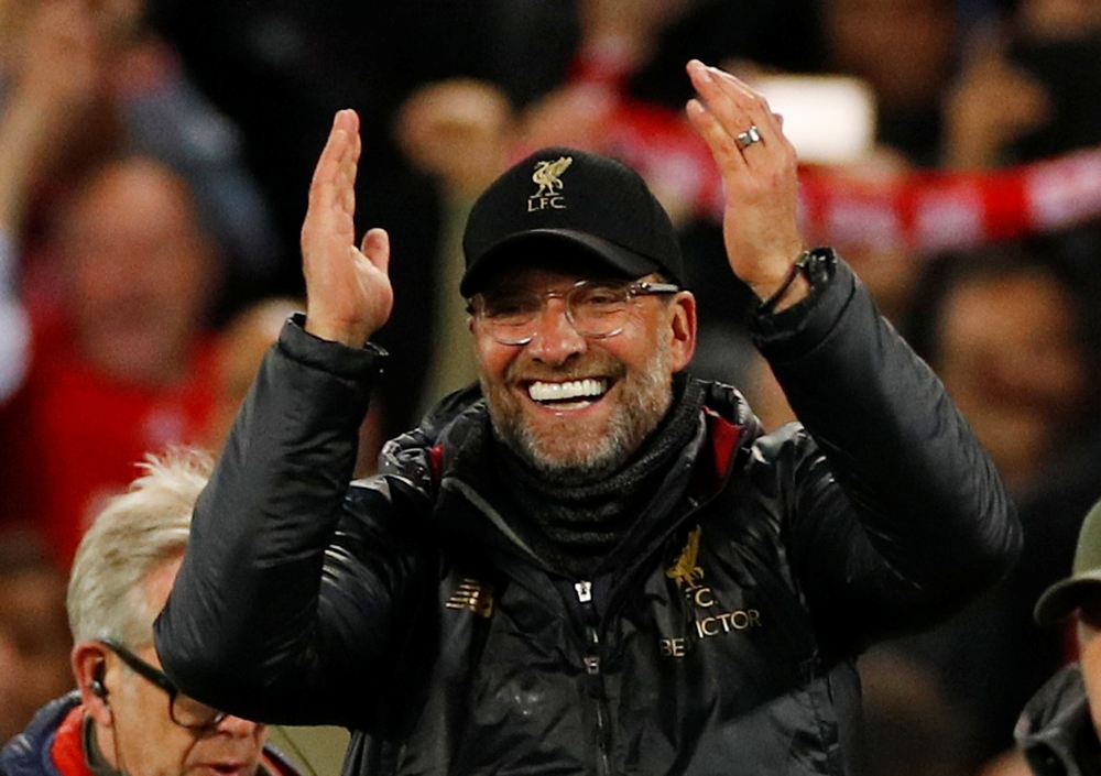 Liverpool manager Juergen Klopp applauds the fans after the Champions League semifinal second leg match against Barcelona at Ainfield on Tuesday. — Reuters
