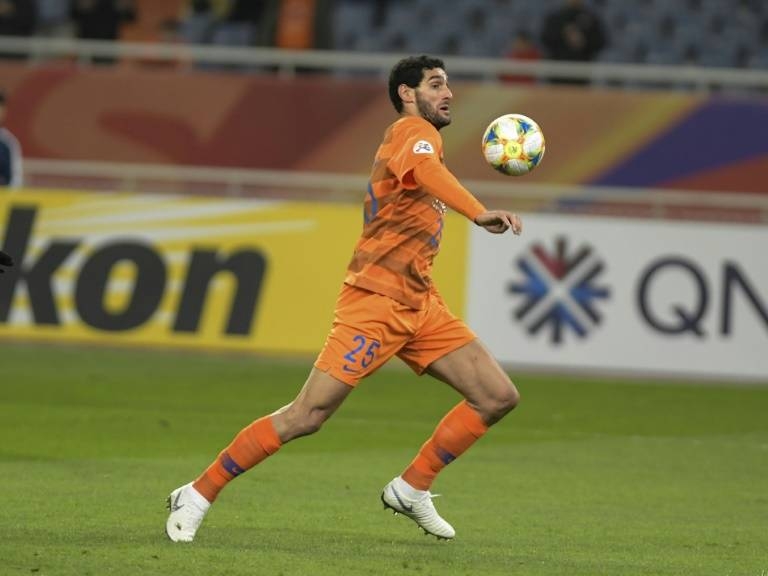 Marouane Fellaini header propelled Shandong Luneng into the Asian Champions League knockouts on Wednesday following a 2-1 win over South Korea's Gyeongnam FC. — AFP