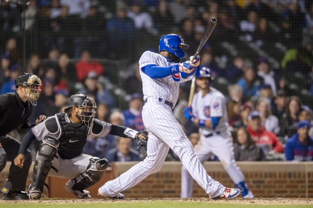 Chicago Cubs center fielder Jason Heyward (22) hits a walk off home run during the eleventh inning against the Miami Marlins at Wrigley Field, Chicago. — Reuters
