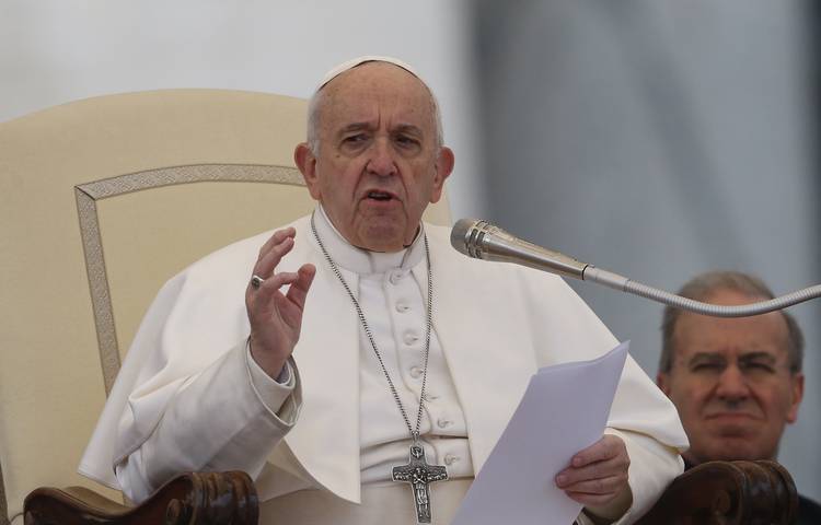 Pope Francis speaks during his general audience in St. Peter's Square at the Vatican.