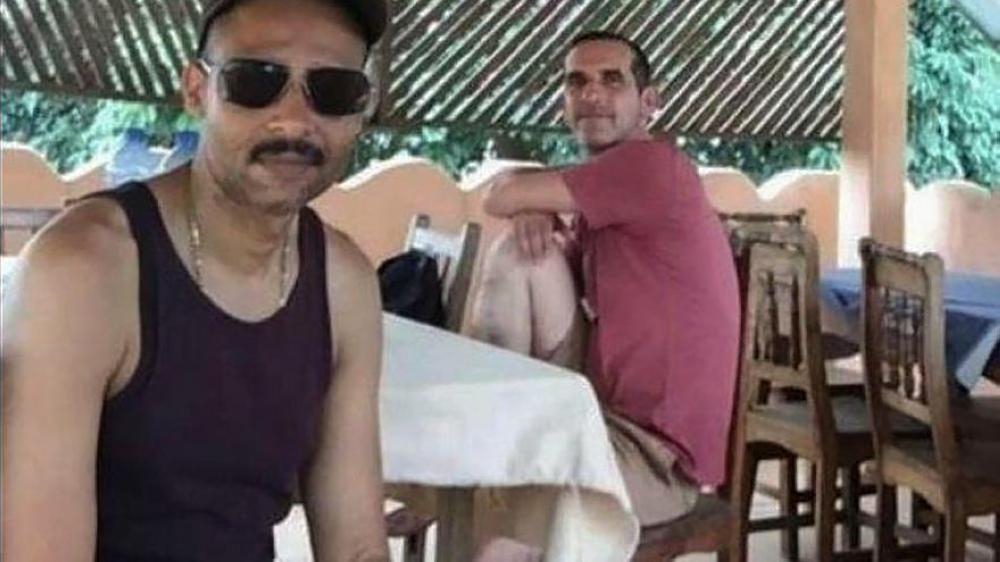 This undated photograph obtained on May 10, 2019, shows Laurent Lassimouillas (L) and Patrick Picque posing at an undisclosed location. — AFP