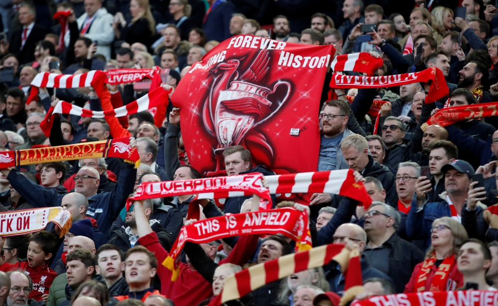 Liverpool fans before the Champions League semifinal second leg match against Barcelona at Anfield, Liverpool, Britain, on Tuesday. — Reuters    