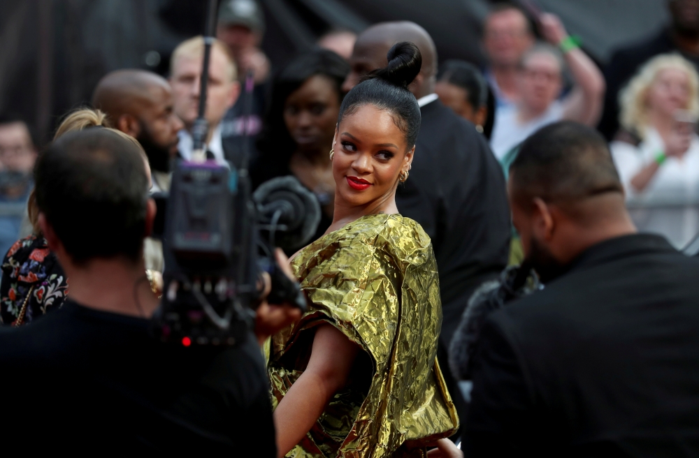 Cast member Rihanna poses for pictures as she arrives for the European premiere of Ocean’s 8 in London in this June 13, 2018 file photo. — Reuters