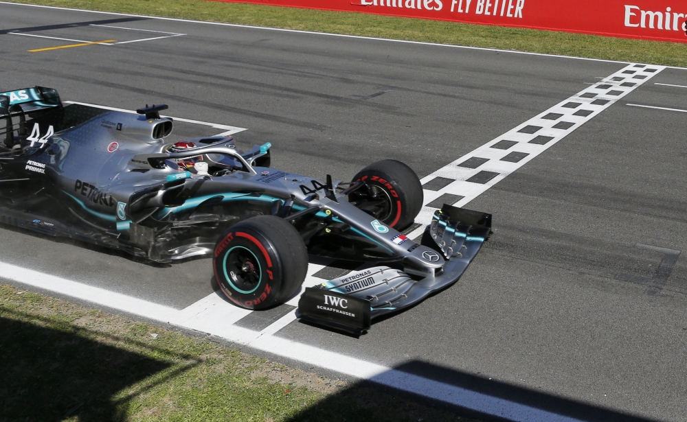 Mercedes' Lewis Hamilton crosses the finish line in the Spanish Formula One F1 Grand Prix at the Circuit de Barcelona-Catalunya, Barcelona, Spain, on Sunday. — Reuters