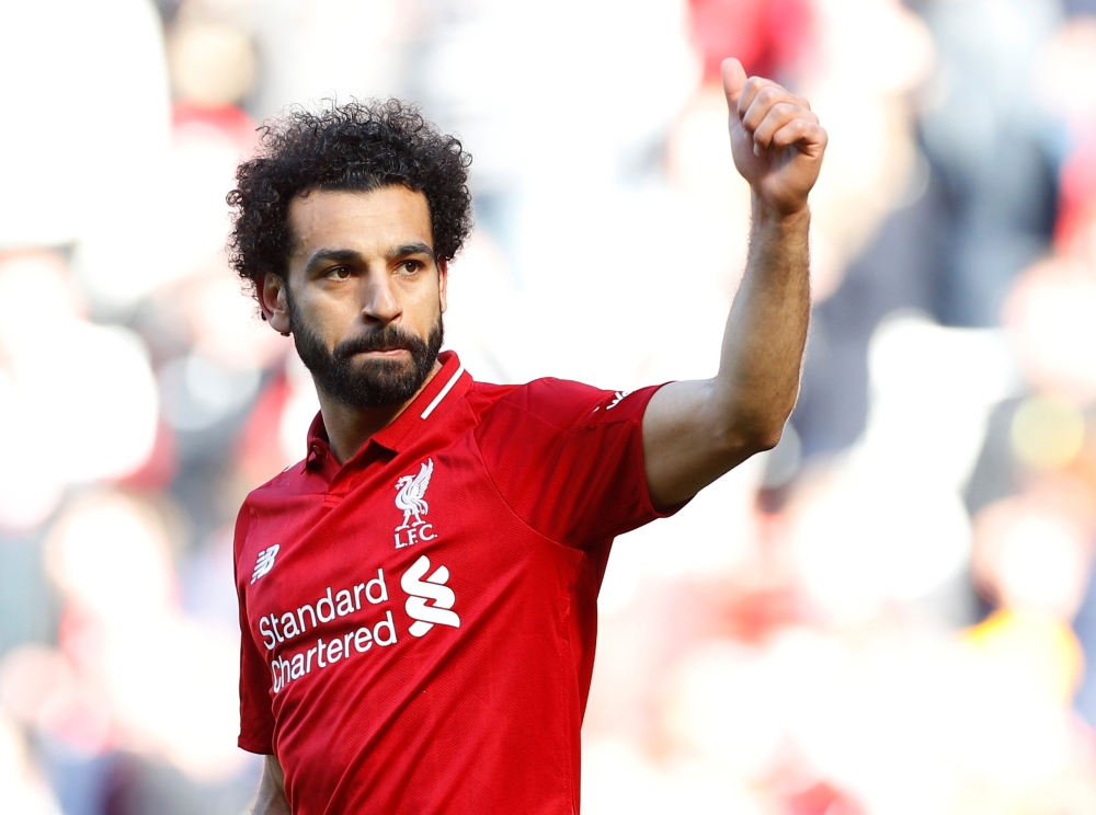 Liverpool's Mohamed Salah gestures to the fans after the Premier League match against Wolverhampton Wanderers at Anfield, Liverpool, Britain, on Sunday. — Reuters