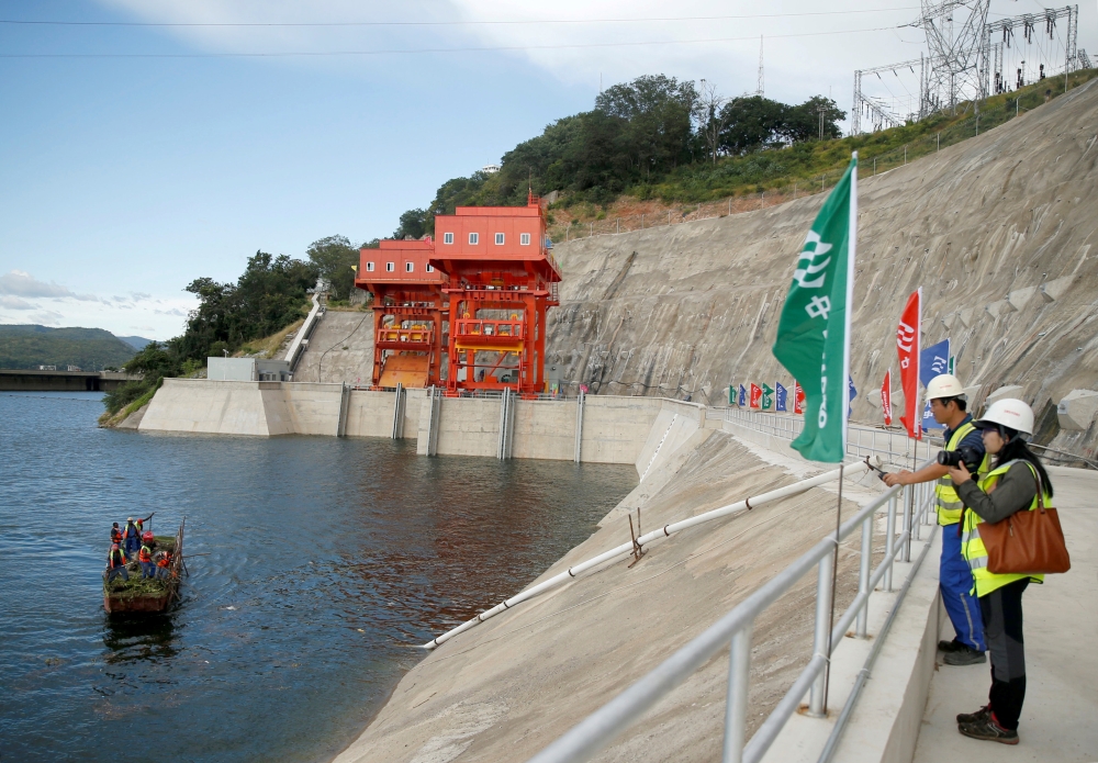 Workers from China’s Sinohydro Corp. are seen outside the Kariba South hydro electric power plant in Kariba, Zimbabwe, in this March 27, 2018 file photo. — Reuters