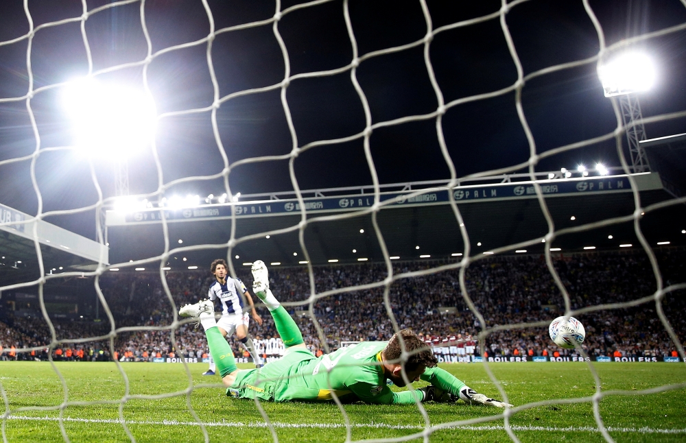 Aston Villa's Jed Steer saves a penalty from West Bromwich Albion's Ahmed Hegazi during the English Championship playoff semifinal second leg shootout at the The Hawthorns, West Bromwich, Britain on Tuesday. —  Reuters
