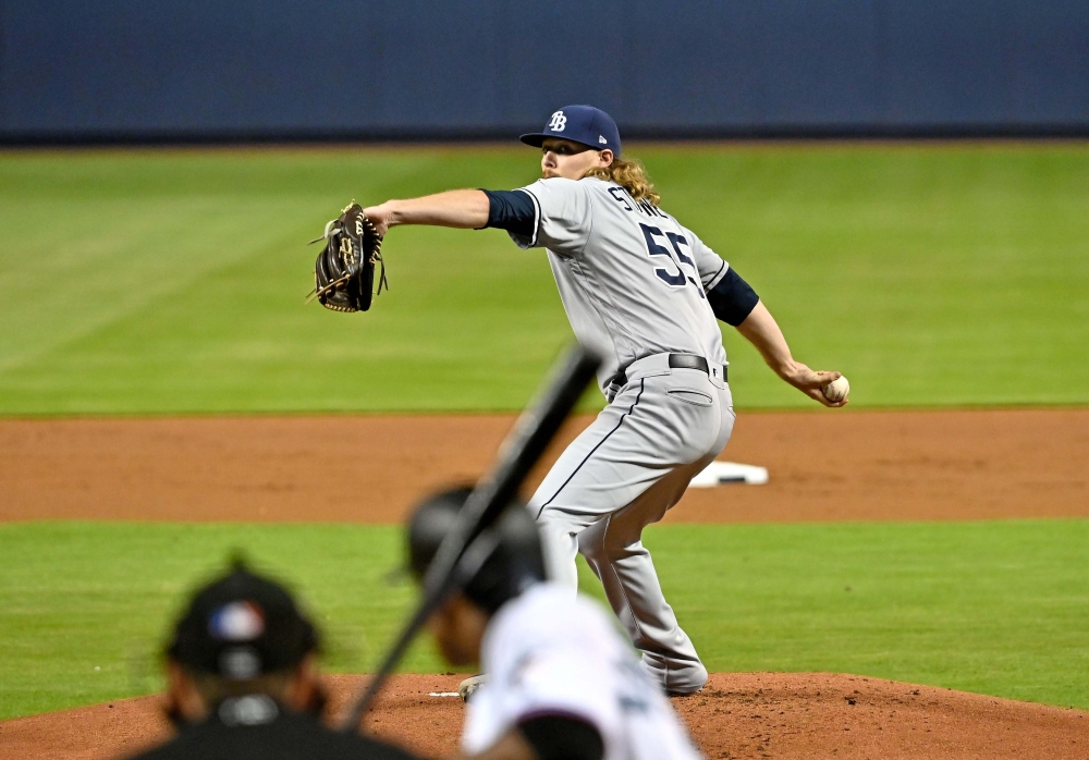 Tampa Bay Rays opener pitcher Ryne Stanek (55) throws a pitch to Miami Marlins left fielder Curtis Granderson (21) in the first inning at Marlins Park. — Reuters