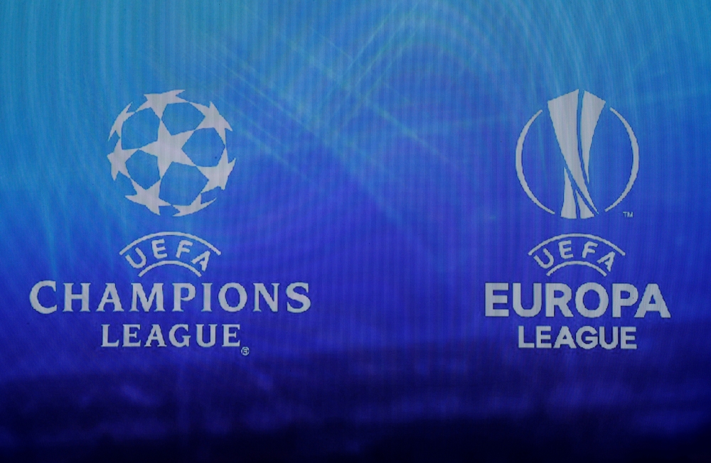 UEFA Champions League and Europa League logos displayed during the draw. — Reuters