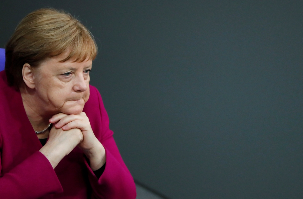 German Chancellor Angela Merkel attends a session at the lower house of parliament Bundestag to mark the 70th anniversary of the German constitution, in Berlin, Germany, May 16. - Reuters