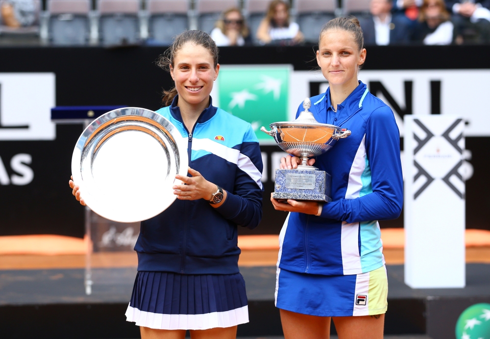 Czech Republic's Karolina Pliskova and Britain's Johanna Konta pose with their trophies after the final in Rome, Sunday. — Reuters