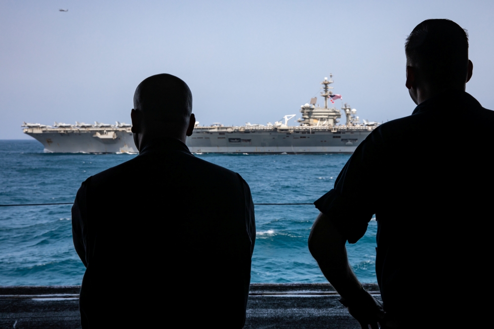 US sailors watch the aircraft carrier USS Abraham Lincoln in Arabian Sea in this May 17, 2019 file photo. — Reuters