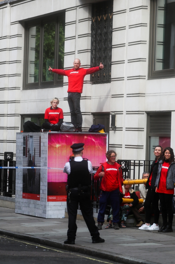 Greenpeace activists blockade an entrance to the BP headquarters in London, May 20. - Reuters