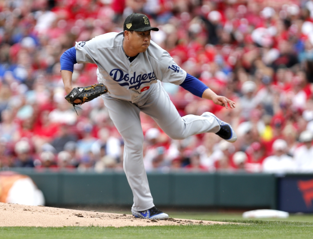 Los Angeles Dodgers starting pitcher Hyun-Jin Ryu (99) releases at pitch against the Cincinnati Reds during the second inning at Great American Ball Park in this May 19, 2019 file photo. — Reuters