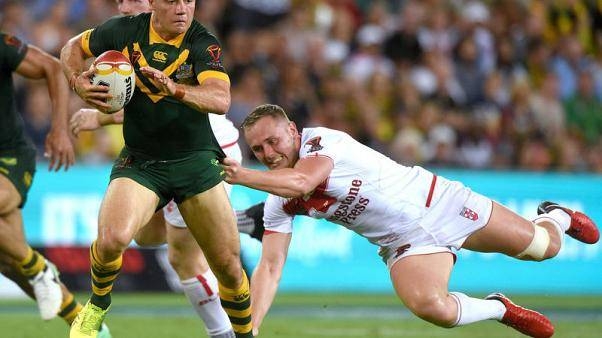 England's Kevin Brown misses a tackle on Australia's Cooper Cronk during their final match in Brisbane, Australia in this Dec. 2, 2017 file photo. — Reuters