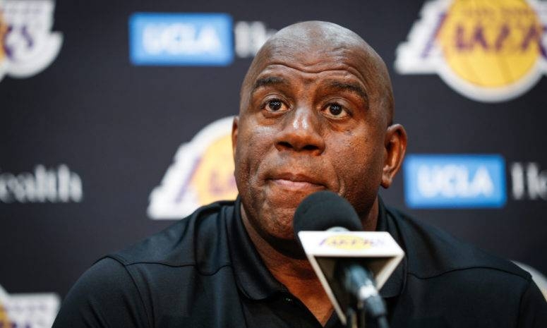 Former Los Angeles Lakers team president Magic Johnson, seen in this file photo, said Monday it was general manager Rob Pelinka's backstabbing ways that led to his resignation in April.