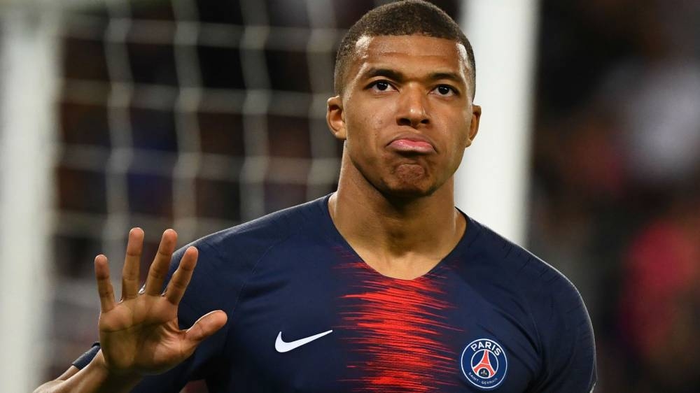 Paris St Germain's Kylian Mbappe, who has already scored 32 goals this season, was named both the best player and best Under-21 player for the 2018-19 season by his peers on Sunday.