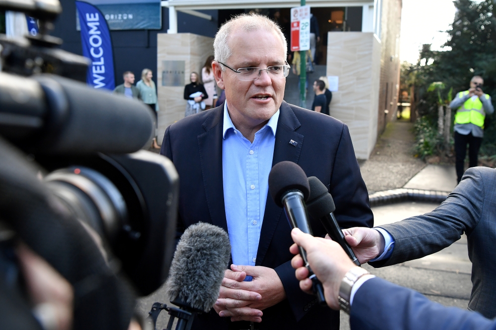 Australian Prime Minister Scott Morrison speaks to the media May 19. - Reuters