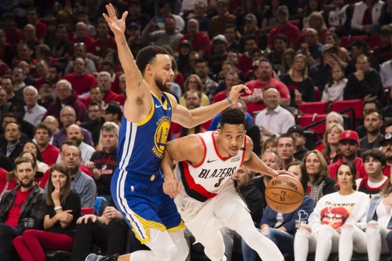 Portland Trail Blazers guard CJ McCollum (3) drives to the basket against Golden State Warriors guard Stephen Curry (30) during the first half in game four of the Western conference finals of the 2019 NBA Playoffs at Moda Center on Monday. — Reuters