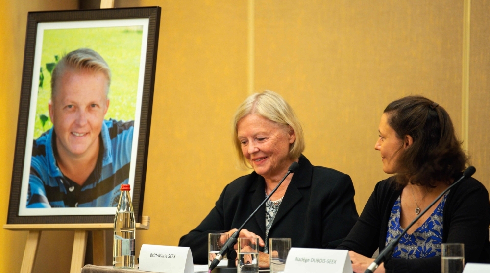 Britt-Marie Seex (C) gestures as she addresses a press conference with Nadege Dubois-Seex (R) in Paris on Tuesday, alongside a portrait of the late Jonathan Seex who was killed in an Ethiopian Airlines Boeing 737 Max 8 aircraft crash on March 10, 2019, on a flight between Addis Ababa and Nairobi. — AFP