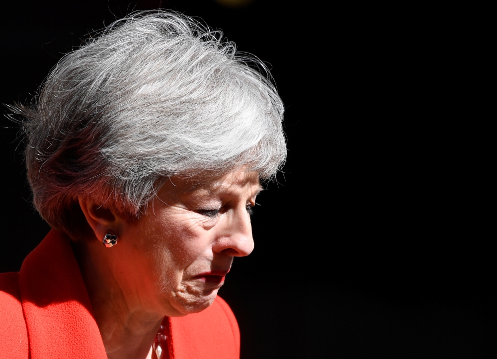 British Prime Minister Theresa May reacts as she delivers a statement in London, Britain, May 24, 2019. — Reuters
