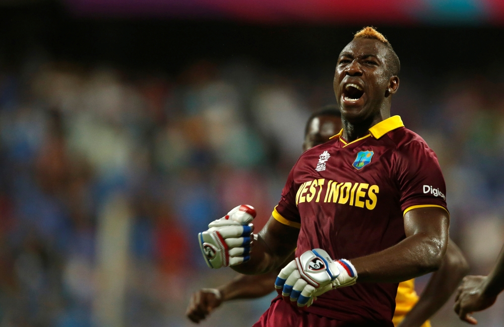 West Indies Andre Russell celebrates after winning their semifinal match against India in the World Twenty20 cricket tournament at Mumbai, India. — Reuters