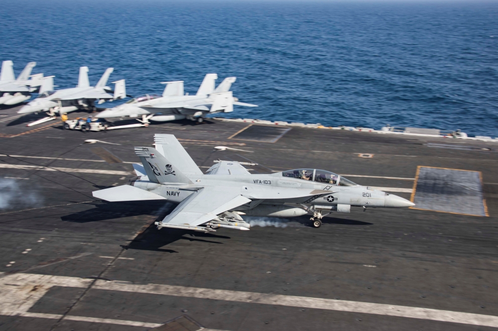 An F/A-18F Super Hornet makes an arrested landing on the flight deck of the US Navy Nimitz-class aircraft carrier USS Abraham Lincoln in the Gulf of Oman in this May 22, 2019 file photo. — Reuters