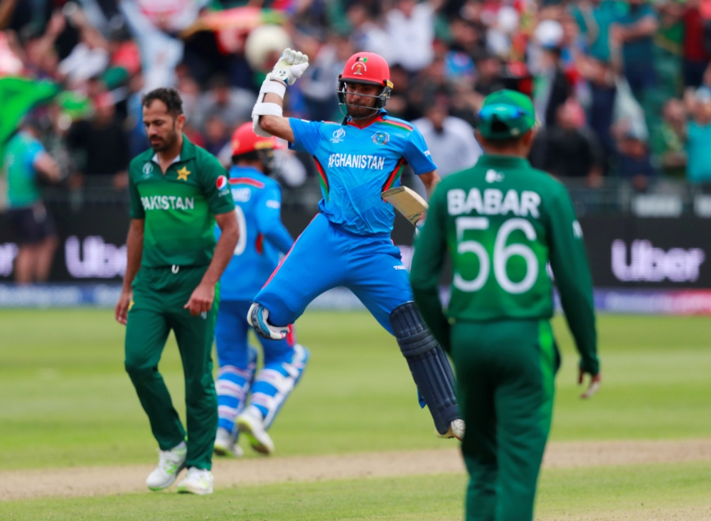 Afghanistan's Hashmatullah Shahidi celebrates victory against Pakistan in the ICC Cricket World Cup warm-up match at the  County Ground, Bristol, Britain, on Friday. — Reuters