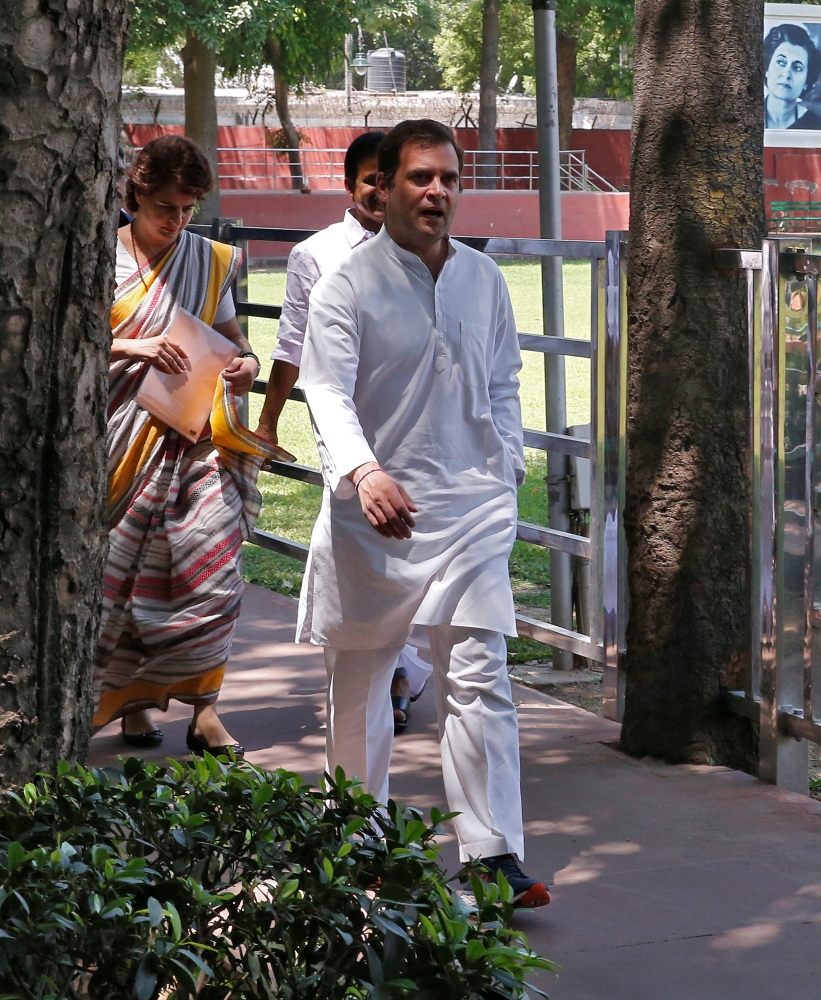 Rahul Gandhi, president of Congress party, his mother and leader of the party Sonia Gandhi and India's former prime minister Manmohan Singh attend a Congress Working Committee (CWC) meeting in New Delhi, Saturday. — Reuters