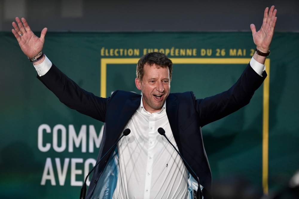 Head candidate of the Europe Ecologie Les Verts (EELV) green list Yannick Jadot reacts after the announcement of initial results during an EELV election-night event for European parliamentary elections at Le Hang'art restaurant in Paris on Sunday. — AFP



  / AFP / STEPHANE DE SAKUTIN