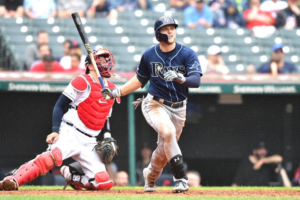 Austin Meadows #17 of the Tampa Bay Rays watches an RBI double to right during the ninth inning against the Cleveland Indians at Progressive Field in Cleveland, Ohio, on Sunday. — Reuters