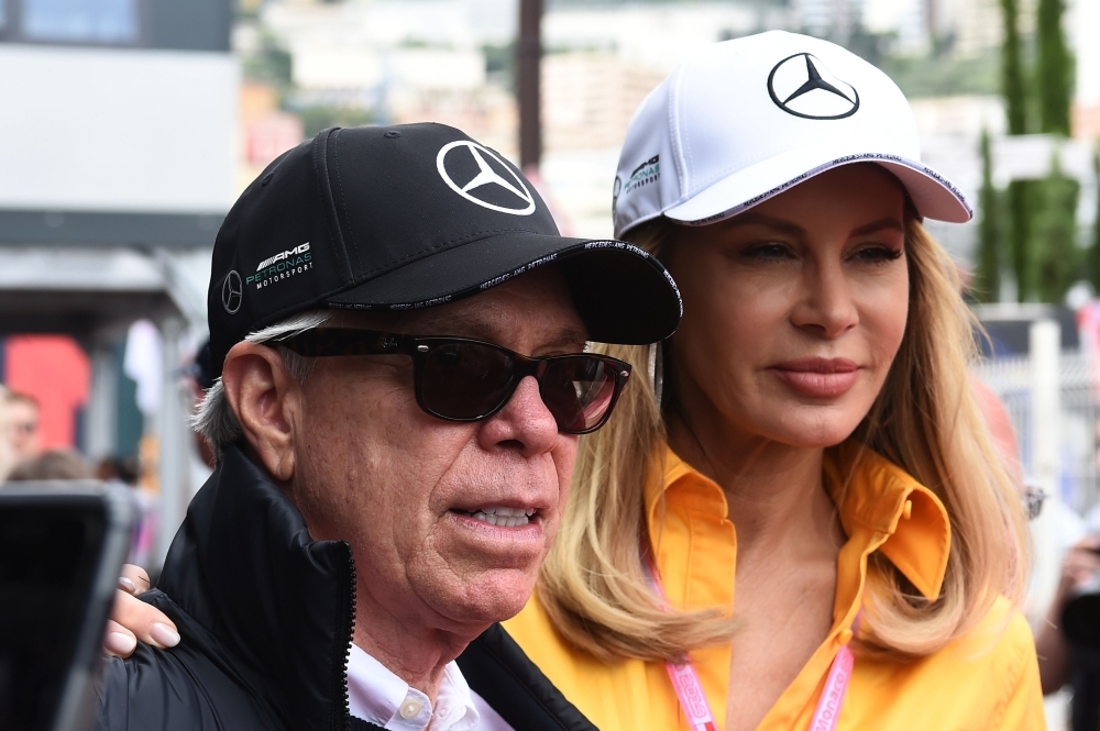 US fashion designer Tommy Hilfiger and his wife Dee Ocleppo Hilfiger visit the pits ahead of the Monaco Formula 1 Grand Prix at the Monaco street circuit in Monaco. — AFP