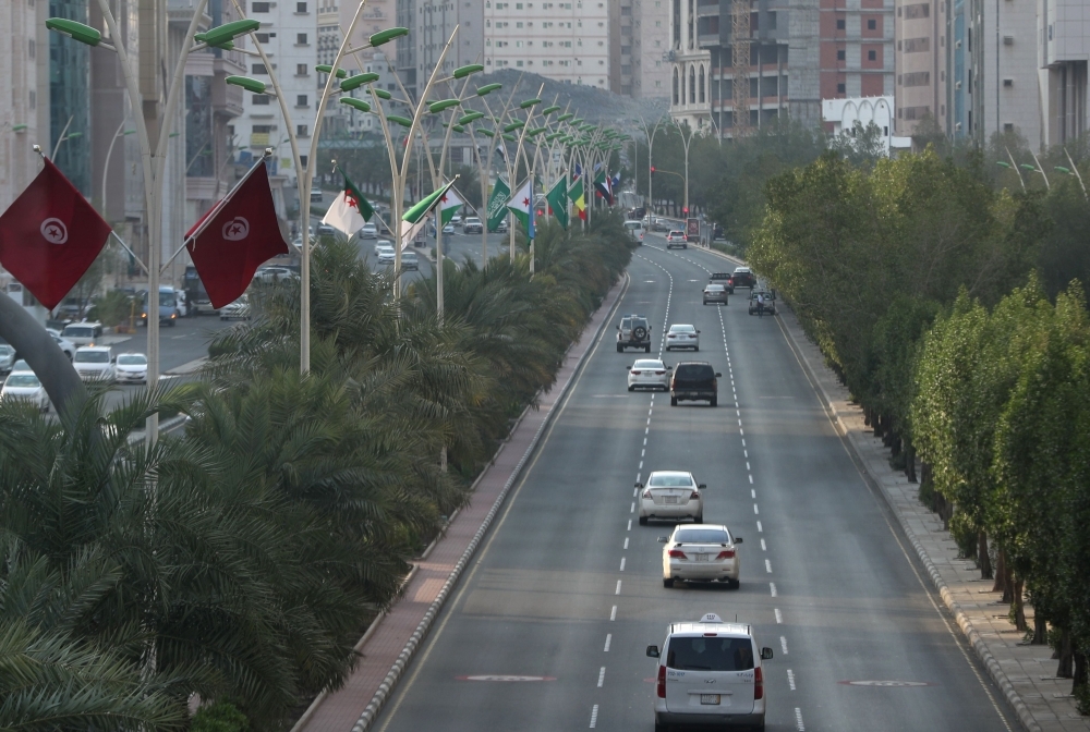 Flags from different countries are pictured in Makkah ahead of the upcoming summits of the Arab League, the Gulf Cooperation Council and OIC. — AFP