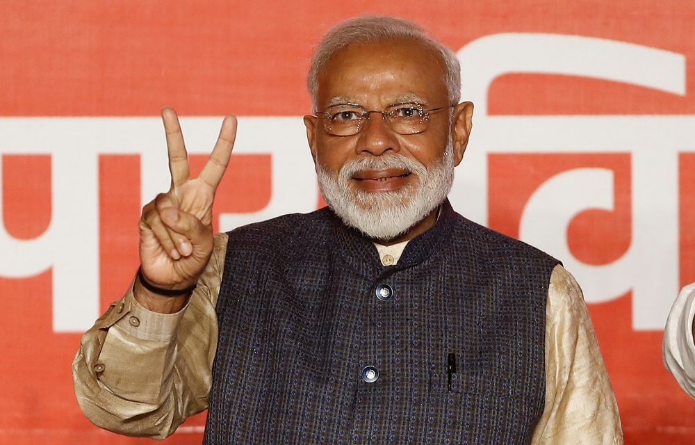 Indian Prime Minister Narendra Modi gestures towards his supporters after the election results on May 23, 2019, at Bharatiya Janata Party (BJP) headquarters in New Delhi, India. — Reuters
