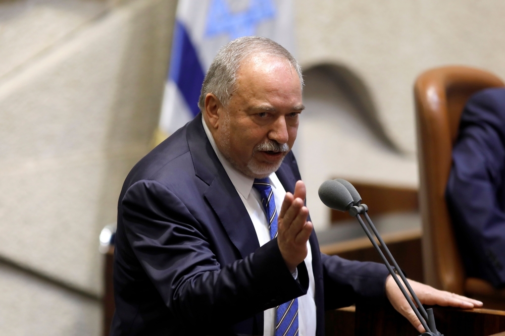 Defense Minister Avigdor Lieberman talks at the Knesset (Israeli parliament) in Jerusalem on Wednesday. Israeli Prime Minister Benjamin Netanyahu urgently worked to break a deadlock in coalition negotiations Tuesday as the once far-fetched possibility of fresh general elections only months after April polls loomed ever larger. Netanyahu has until Wednesday night to reach a coalition deal, but he has been unable to convince ex-defence minister Avigdor Lieberman to abandon a key demand and allow a government to be formed. — AFP