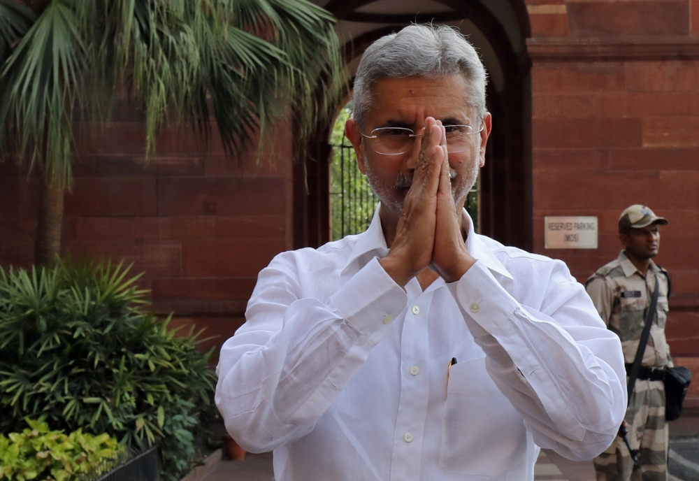 India's newly appointed Foreign Minister Subrahmanyam Jaishankar greets the media outside the foreign ministry building in New Delhi on Friday. — Reuters