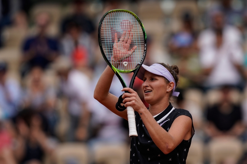 Czech Republic's Marketa Vondrousova celebrates after winning against Spain's Carla Suarez Navarro at the end of their women's singles third round match on day six of The Roland Garros 2019 French Open tennis tournament in Paris on Friday. — AFP