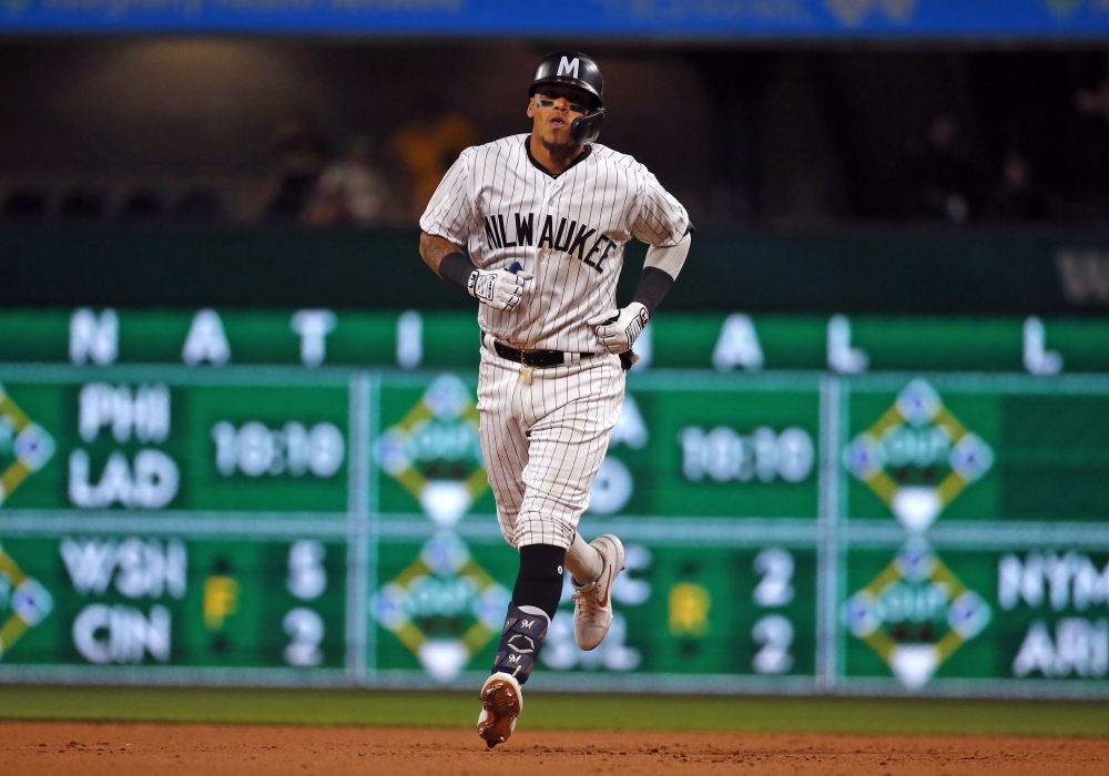 Orlando Arcia #3 of the Milwaukee Brewers rounds second after hitting a two run home run in the thirteenth inning against the Pittsburgh Pirates at PNC Park in Pittsburgh, Pennsylvania, on Saturday. — AFP