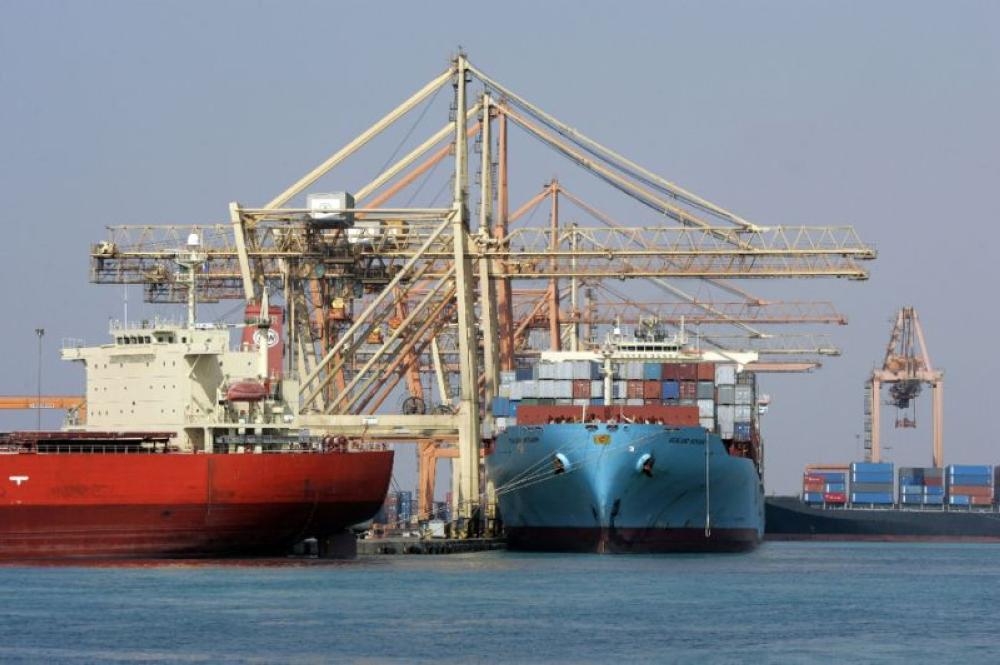 Cranes unload containers from the deck of ships in the Jeddah Islamic Port in this file photo. — AFP