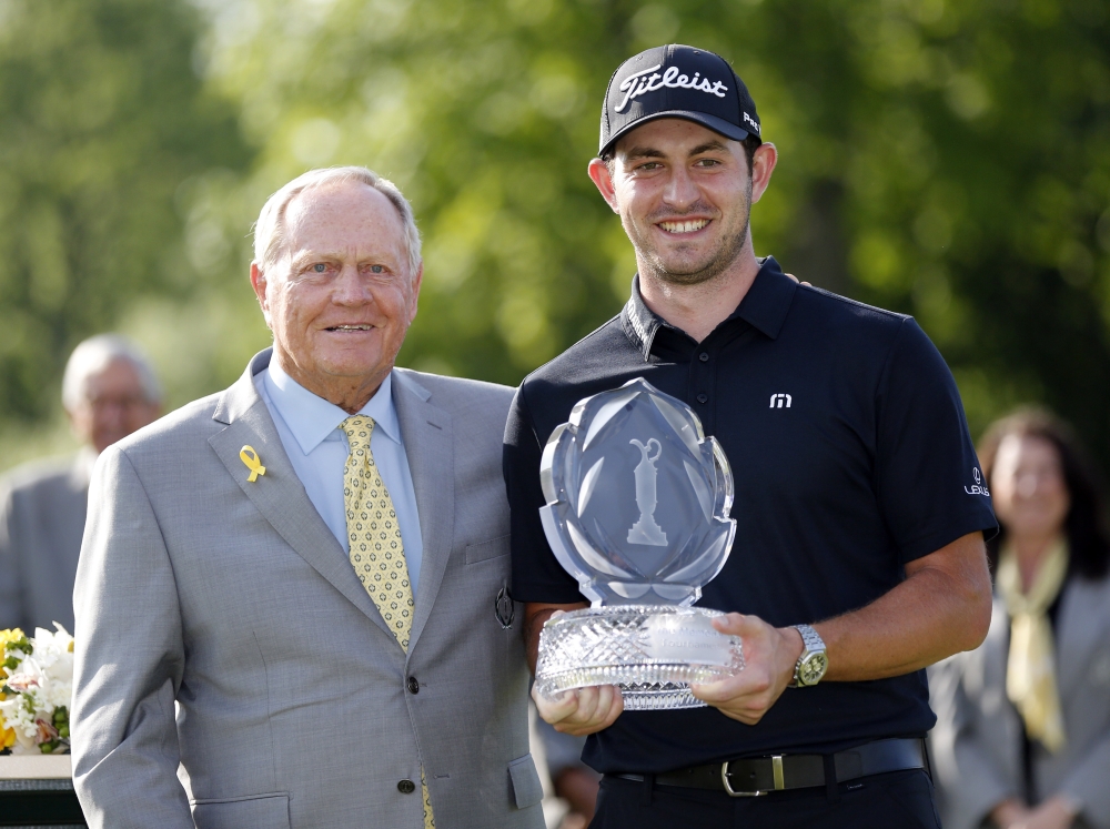 Jack Nicklaus presents the trophy to Patrick Cantlay after winning the 2019 Memorial golf tournament at Muirfield Village Golf Club. — Reuters