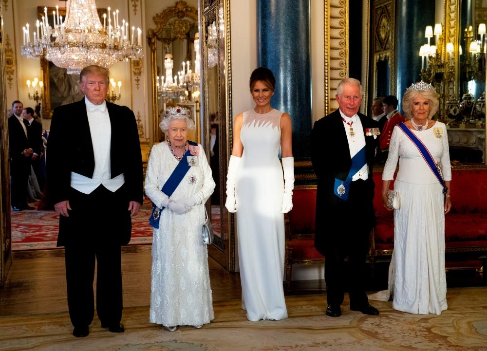 US President Donald Trump, First Lady Melania Trump, Britain's Queen Elizabeth, Britain's Charles, the Prince of Wales and Camilla, Duchess of Cornwall are seen at the State Banquet at Buckingham Palace in London, Britain, Monday. — Reuters