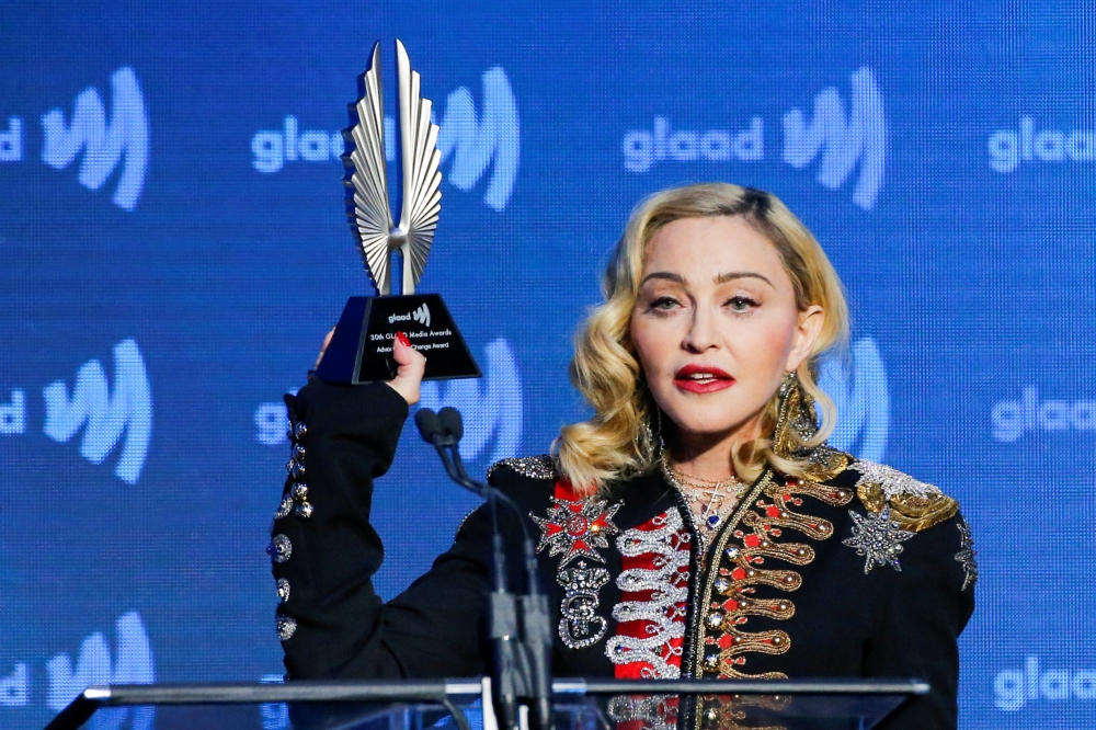 Singer Madonna holds up her Advocate for Change award during the 30th annual GLAAD awards ceremony in New York City, New York, in this May 4, 2019 file photo. — Reuters